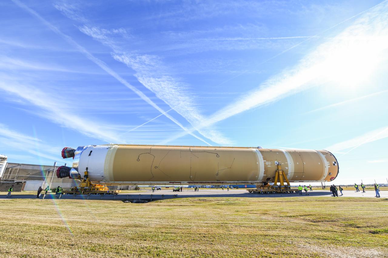 These images show how the team rolled out the completed core stage for NASA’s Space Launch System rocket from NASA’s Michoud Assembly Facility in New Orleans. Crews moved the flight hardware for the first Artemis mission to NASA’s Pegasus barge on Jan. 8 in preparation for the core stage Green Run test series at NASA’s Stennis Space Center near Bay St. Louis, Mississippi. Pegasus, which was modified to ferry SLS rocket hardware, will transport the core stage from Michoud to Stennis for the comprehensive core stage Green Run test series. Once at Stennis, the Artemis rocket stage will be loaded into the B-2 Test Stand for the core stage Green Run test series. The comprehensive test campaign will progressively bring the entire core stage, including its avionics and engines, to life for the first time to verify the stage is fit for flight ahead of the launch of Artemis I. Assembly and integration of the core stage and its four RS-25 engines has been a collaborative, multistep process for NASA and its partners Boeing, the core stage lead contractor, and Aerojet Rocketdyne, the RS-25 engines lead contractor. Together with four RS-25 engines, the rocket’s massive 212-foot-tall core stage — the largest stage NASA has ever built — and its twin solid rocket boosters will produce 8.8 million pounds of thrust to send NASA’s Orion spacecraft, astronauts and supplies beyond Earth’s orbit to the Moon and, ultimately, Mars. Offering more payload mass, volume capability and energy to speed missions through space, the SLS rocket, along with NASA’s Gateway in lunar orbit and Orion, is part of NASA’s backbone for deep space exploration and the Artemis lunar program.